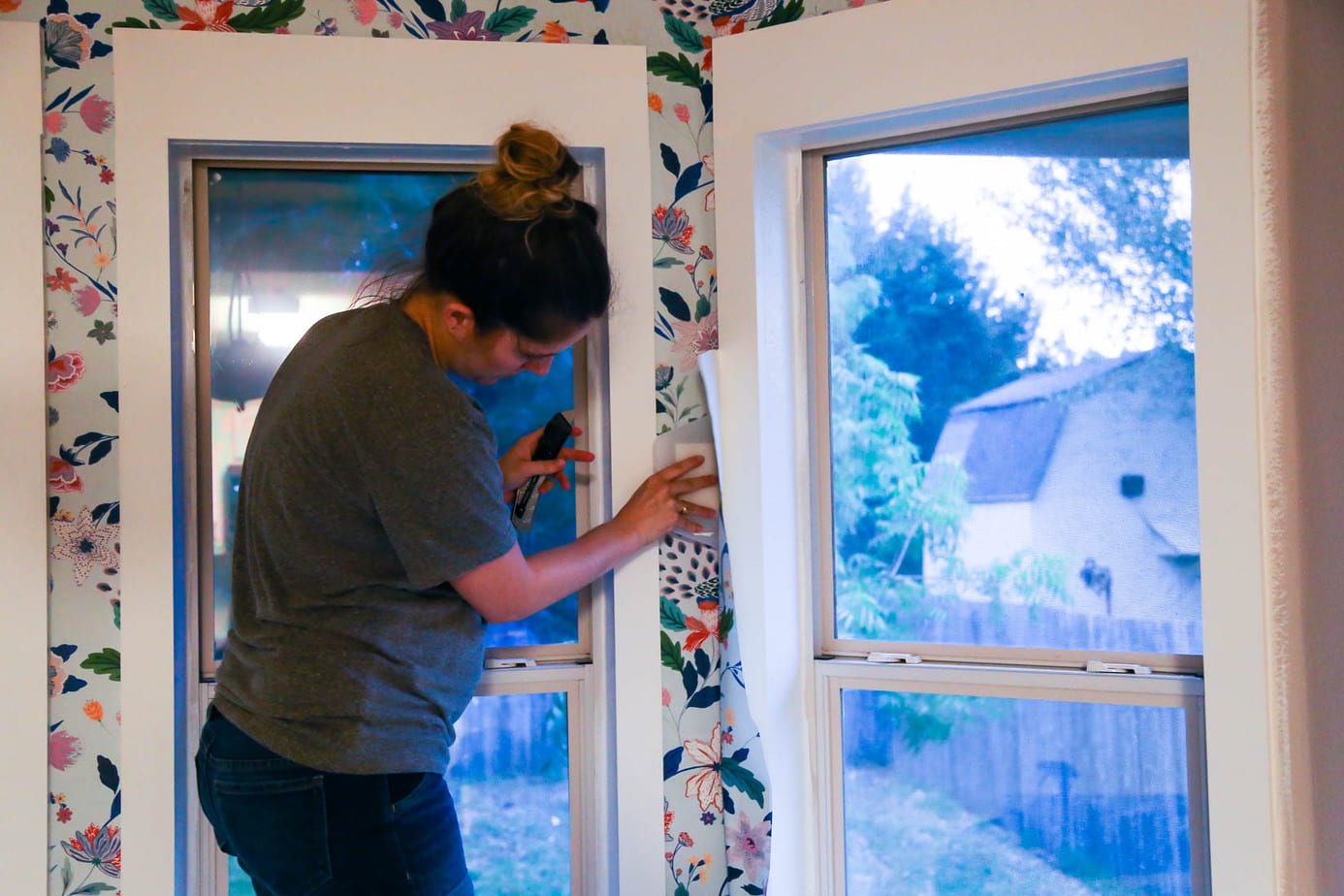 wallpaper installation around window