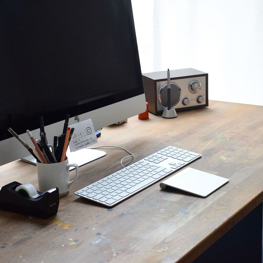 Trendy home office with 3D wall panels and accessories