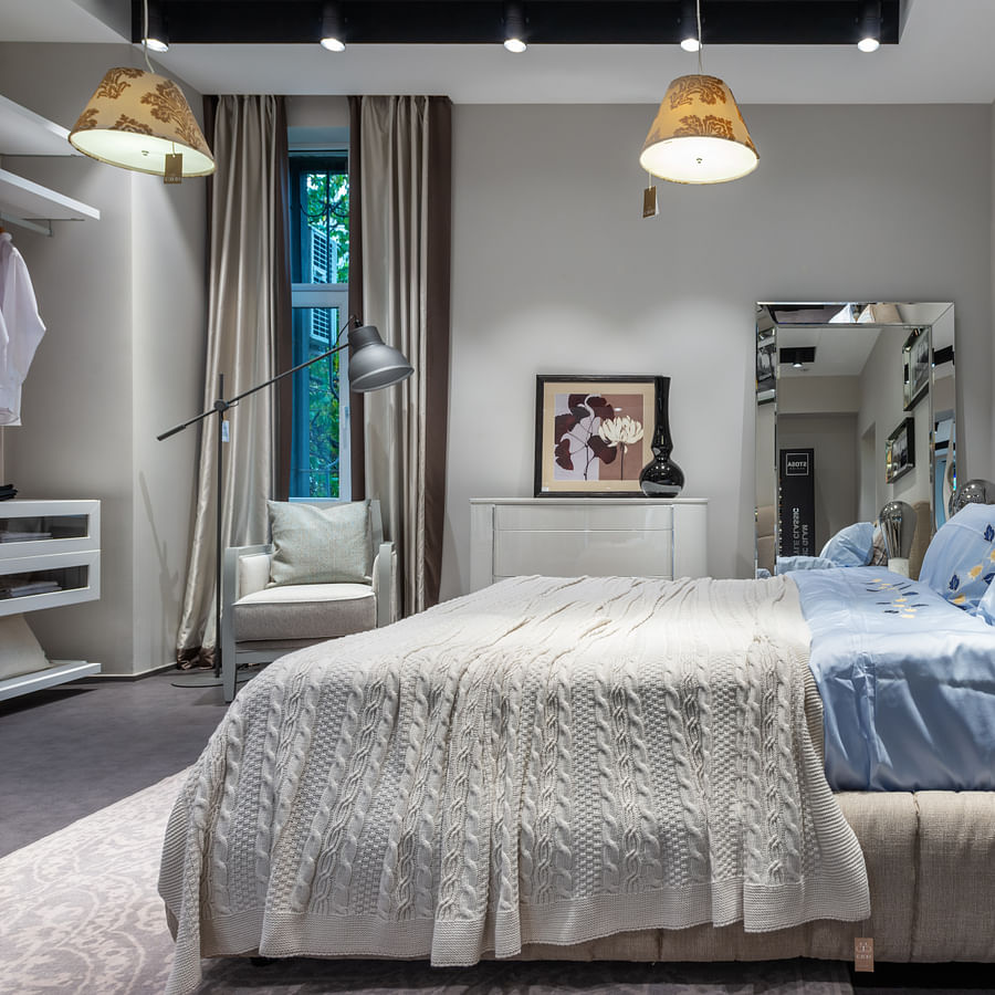 Serene bedroom with stylish 3D wall paneling